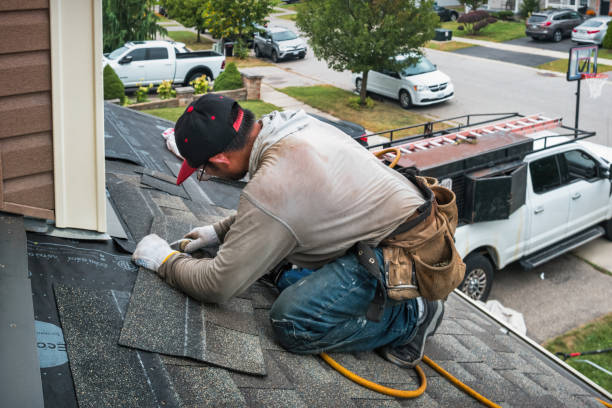 Professional Roof Replacement technician working in Port Republic, NJ